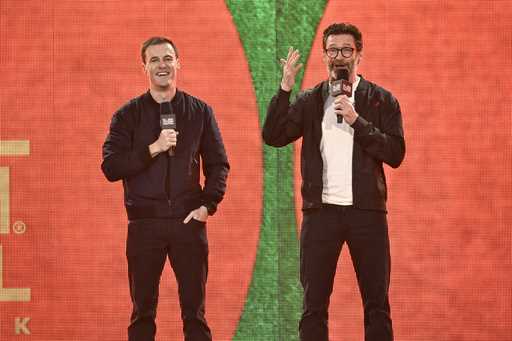 Global Citizen co-founder Hugh Evans, left, and Hugh Jackman speak during the Global Citizen Festiv…