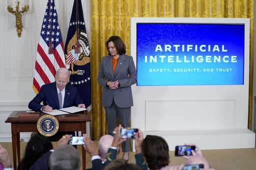 President Joe Biden signs an executive on artificial intelligence in the East Room of the White Hou…