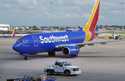 A Southwest Airlines plane moves to departs from Love Field in Dallas, Thursday, July 25, 2024