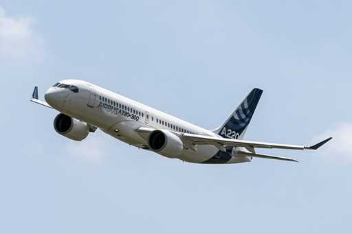 An Airbus A220 lands at Toulouse-Blagnac airport, July 10, 2018, in southwestern France