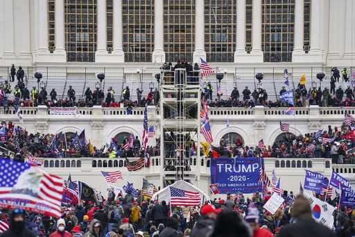 Insurrectionists loyal to President Donald Trump breach the Capitol in Washington, January 6, 2021