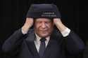 Ontario Premier Doug Ford dons a toque following a press conference with Chief Sonny Gagnon of Arol…