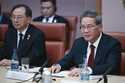 Chinese Premier Li Qiang meets the Minister for Agriculture, Senator Murray Watt, right, at Magill …