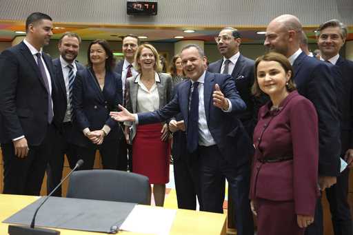 European Union foreign ministers pose with European Union foreign policy chief Kaja Kallas, center,…