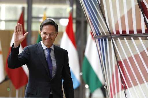 Netherland's Prime Minister Mark Rutte waves as he arrives for an EU summit in Brussels, Thursday, …