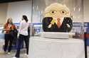 The Squishmallows booth sells toys modeled after Warren Buffett, pictured, and Charlie Munger in th…