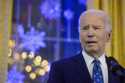 President Joe Biden speaks during a Hanukkah reception in the East Room of the White House in Washi…