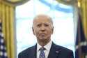 President Joe Biden pauses during a photo opportunity with Medal of Valor recipients in the Oval Of…