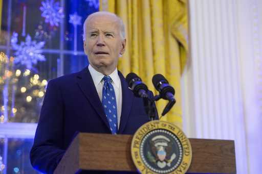 President Joe Biden speaks during a Hanukkah reception in the East Room of the White House in Washi…