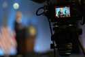 President Joe Biden, seen on a video camera screen, speaks at a news conference Thursday July 11, 2…