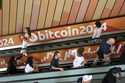 People arrive at the Bitcoin 2024 Conference on July 24, 2024, in Nashville, Tenn