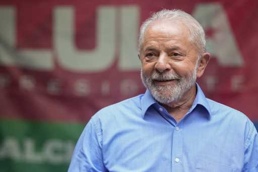 Brazil's former President Luiz Inacio Lula da Silva, who is running for reelection, smiles during a…