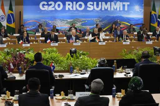 Leaders attending the G20 Summit pose for a group photo in Rio de Janeiro, Monday, November 18, 202…