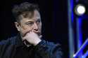 Tesla and SpaceX chief executive officer Elon Musk listens to a question as he speaks at the SATELL…