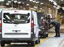 An employee inspects a car at the Vauxhall vehicle production plant in Luton, England, February 2, …