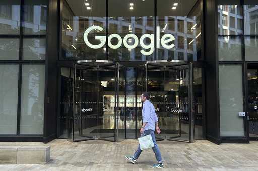 A man walks past Google's offices in London's Kings Cross area, on August 10, 2024