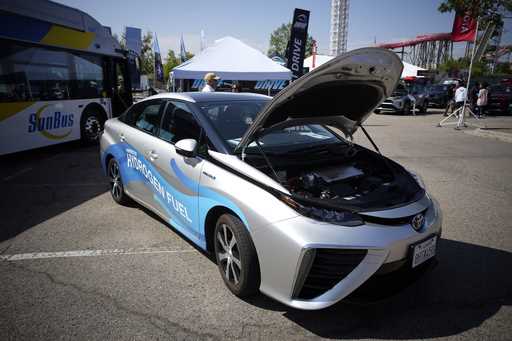 A 2021 Toyota Prius that runs on a hydrogen fuel cell sits on display at the Denver auto show on Se…