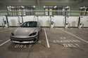 Charging bays are seen at the new Electrify America indoor electric vehicle charging station in San…