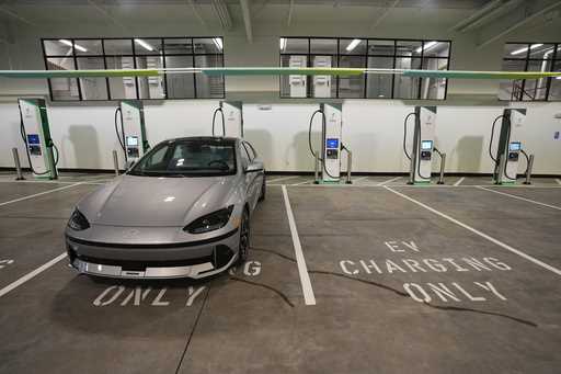 Charging bays are seen at the new Electrify America indoor electric vehicle charging station in San…