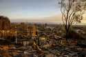 A home destroyed by the Palisades Fire is seen during sunset in Pacific Palisades, Calif