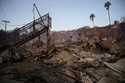 A staircase is left partially standing in a property in the aftermath of the Palisades Fire in the …