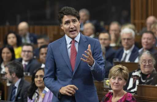 Prime Minister Justin Trudeau rises to respond to questions from the opposition during Question Per…