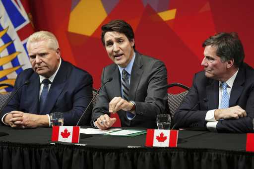 Ontario Premier Doug Ford, left, and Intergovernmental Affairs Minister Dominic Leblanc, right, loo…