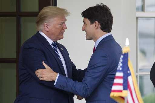 President Donald Trump greets Canadian Prime Minister Justin Trudeau upon his arrival at the White …