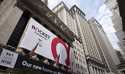 A Rocket Companies sign is displayed on the exterior of the New York Stock Exchange, Thursday, Augu…