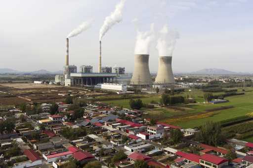 Guohua Power Station, a coal-fired power plant, operates in Dingzhou, Baoding, in the northern Chin…