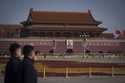 Chinese paramilitary policemen stand guard during a preparatory session meeting of China's National…