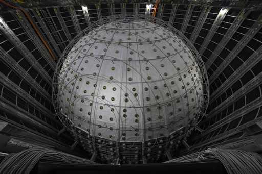 The $300 million detector is seen at the Jiangmen Underground Neutrino Observatory located 2297 fee…