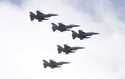 Taiwan's F-16 fighter jets fly in close formation over President Office during National Day celebra…