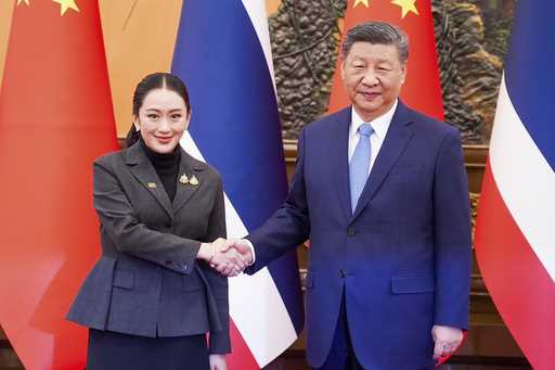 In this photo released by the Thailand's Government Spokesman Office, Chinese President Xi Jinping,…