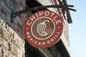 The Chipotle Mexican Grill logo hangs outside a restaurant location, December 20, 2022, in Westwood…