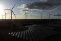 Wind turbines spin at the Klettwitz Nord solar energy park near Klettwitz, Germany, October 15, 202…