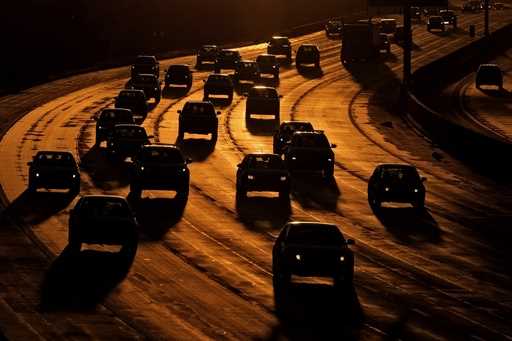 Traffic flows on Interstate 435 on Sept. 25, 2024, in Leawood, Kan. (AP Photo/Charlie Riedel, File)