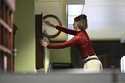 Bethany Gill winds a clock in the offices where news media correspondents work in the Pennsylvania …