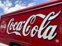 The Coca-Cola logo adorns the side of a delivery truck May 15, 2024, in southeast Denver