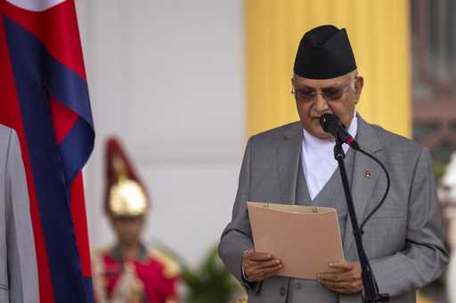 Newly elected Prime Minister Khadga Prasad Oli is being sworn by President Ram Chandra Paudel, unse…