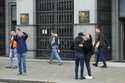 People stand outside the Czech central bank in Prague, Czech Republic, Thursday, November 2, 2023