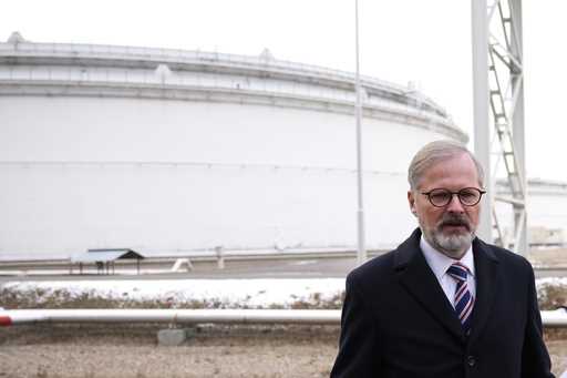 Czech Republic's Prime Minister Petr Fialla addresses media at the Central Oil Tank Farm near Nelah…