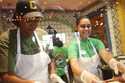 Latrice Walker and Christina Rivera make fresh tortillas on opening day at Chuy's in Jacksonville, …
