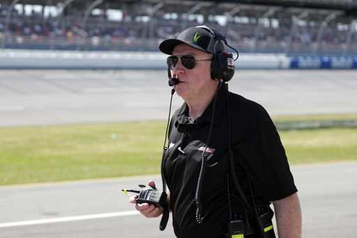 Larry McReynolds, crew chief for NASCAR Xfinity Series driver Jeffrey Earnhardt walks to the pit be…