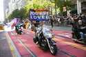 Bikers, center, ride a Harley Davidson motorcycle in the annual Pride Parade in San Francisco June …