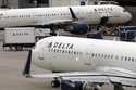 A Delta Air Lines plane leaves the gate, July 12, 2021, at Logan International Airport in Boston