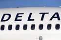 FILE -A Delta Air Lines jetliner is shown at Denver International Airport in Denver, June 26, 2019