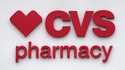 The CVS Pharmacy logo is displayed on a store on August 3, 2021, in Woburn, Mass