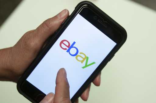 An eBay app is shown on a mobile phone, July 11, 2019, in Miami