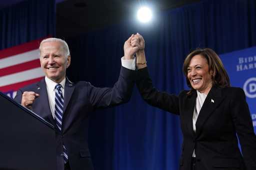 President Joe Biden and Vice President Kamala Harris stand on stage at the Democratic National Comm…